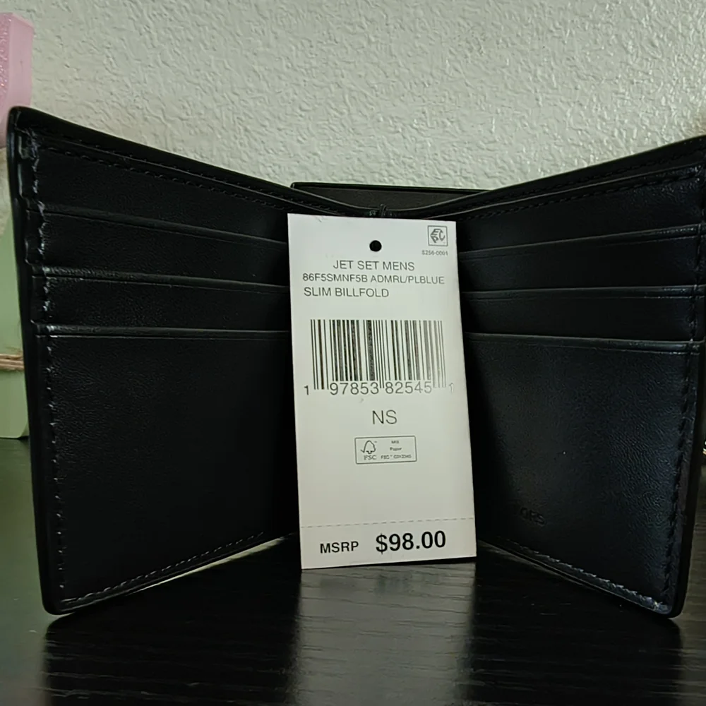Michael Kors compact money